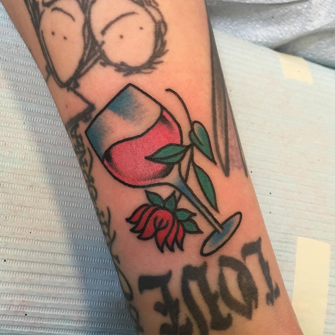 Wine glass and rose tattoo