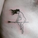 Witch on a broom tattoo