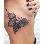 Grapes on a branch tattoo