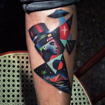 Nefertiti and flying saucer tattoo
