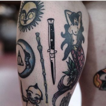 Awesome traditional tattoos on the thigh