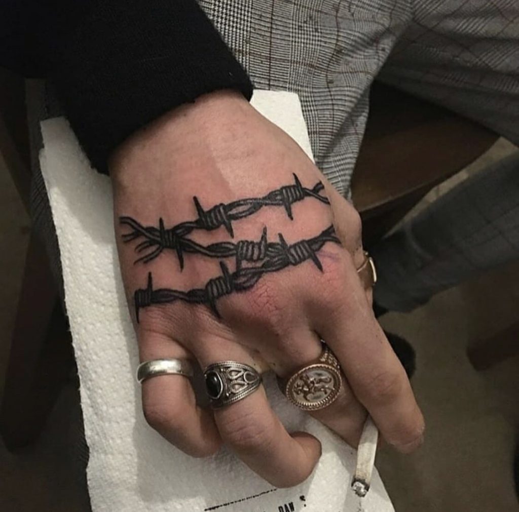 Barbed wire tattoo on the hand