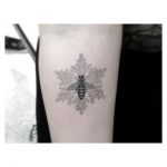 Bee and snowflake tattoo