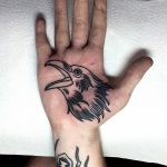 Bird's head tattoo