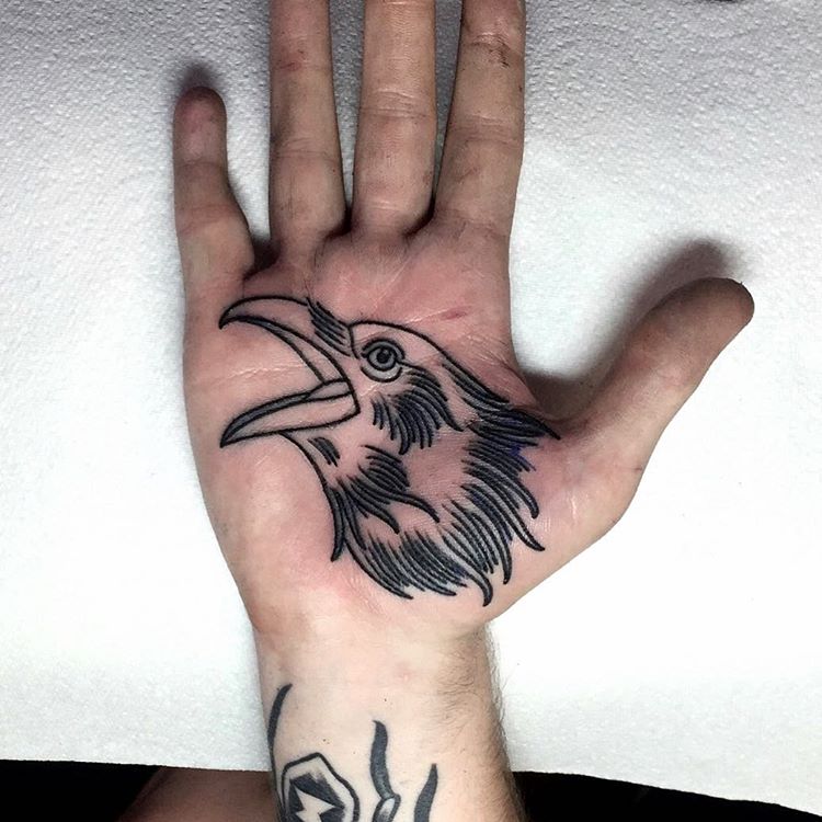 Bird’s head tattoo