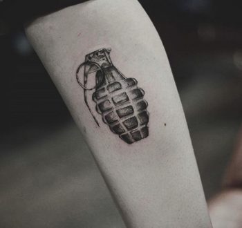 Black and grey grenade tattoo by kristian