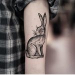 Black and grey rabbit tattoo by jonas