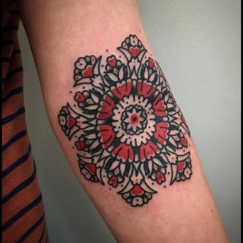Black and red mandala tattoo by bastien jean