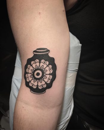 Black and white vase tattoo