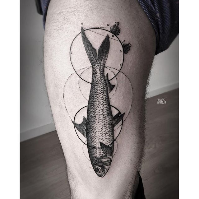 Black fish and circle tattoos