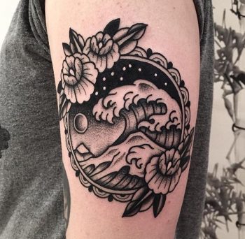 Black ocean wave tattoo