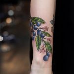 Blueberries tattoo on the wrist