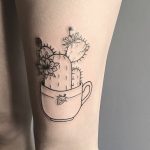Cactus in a teacup tattoo