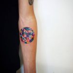 Circular and colorful geometric tattoo