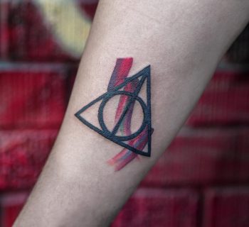 Colorful deathly hallows tattoo