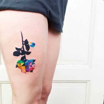 Colorful geometric rose tattoo
