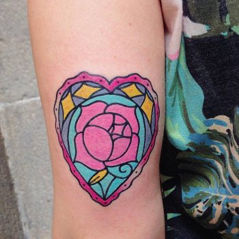 Colorful heart shaped rose tattoo