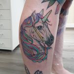 Colorful unicorn tattoo