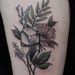 Crystal and wildflowers tattoo