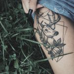 Deer and flowers tattoo
