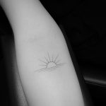 Elegant sunrise tattoo by jakub nowicz