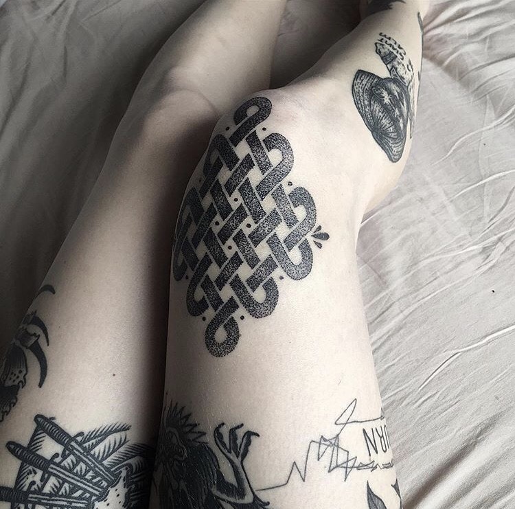 Endless knot tattoo on the knee