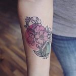 Flower tattoo by emily kaul