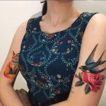 Fox, swallow and rose tattoos