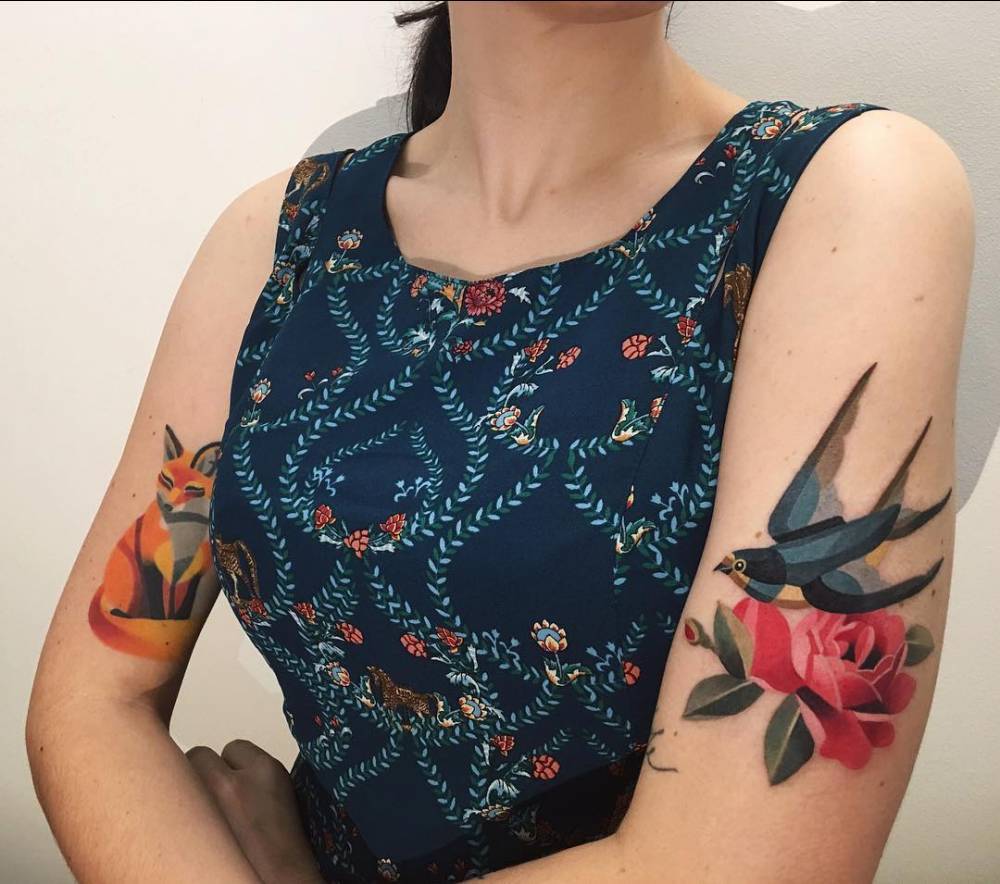 Fox, swallow and rose tattoos