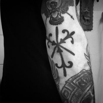 Freehand serbian ornament tattoo on the elbow