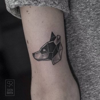 Geometric dog head tattoo
