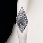 Gorgeous negative space pattern tattoo
