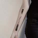 Gradient black and grey line tattoo