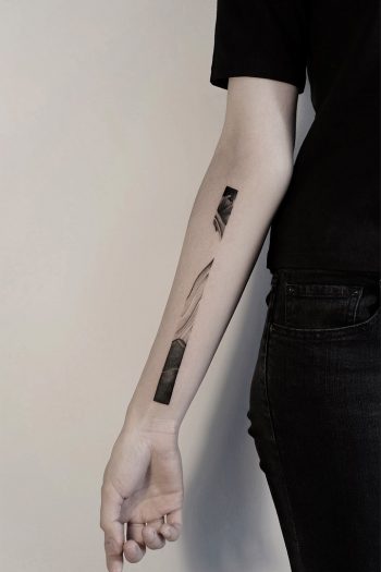 Gradient black and grey line tattoo