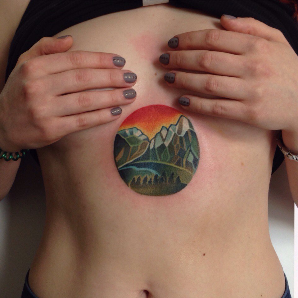 Greenish mountains tattoo