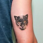 Hand poked panther tattoo
