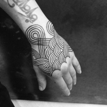 Hand ornament tattoo