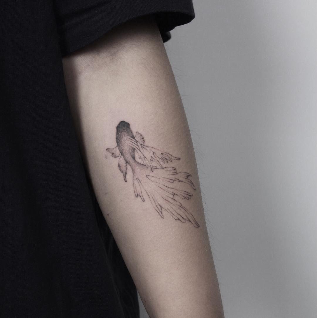 Hand poked bettafish tattoo
