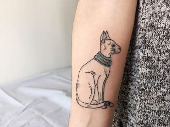 Hand poked goddess bastet tattoo