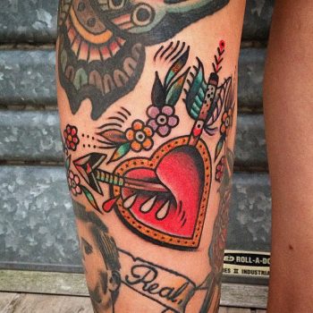 Heart and broken arrow tattoo