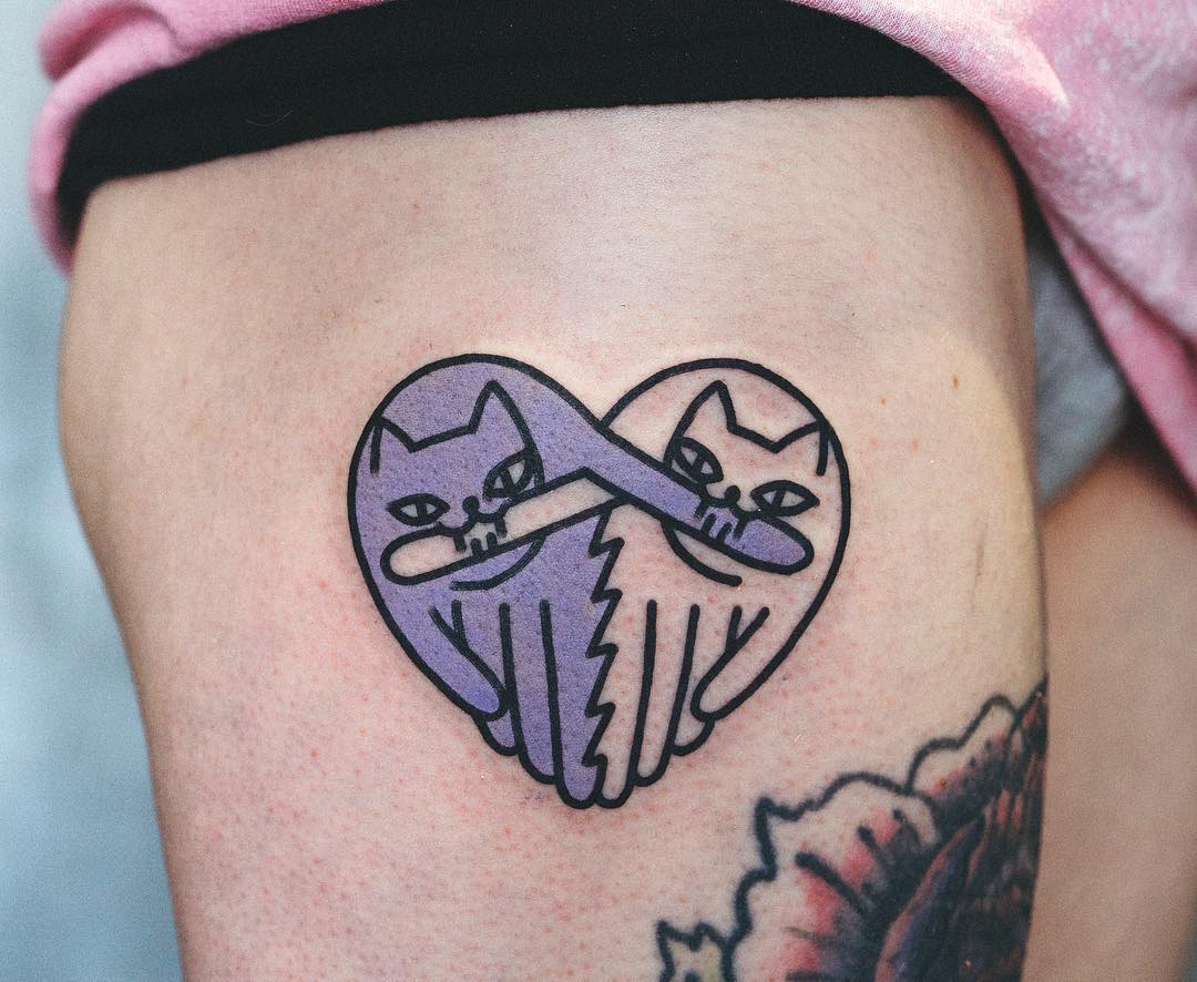 Heart shaped cats tattoo