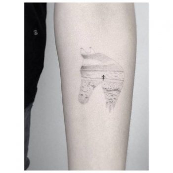 Horse head shaped landscape tattoo