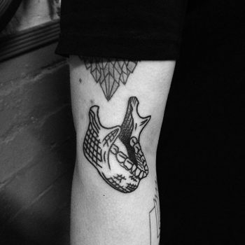Human jaw tattoo