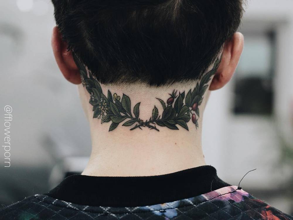 Laurel wreath tattoo on the back of the neck