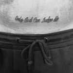 Legendary phrase inked on the belly