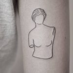 Linear woman's bust tattoo