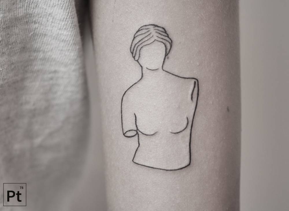 Linear woman’s bust tattoo