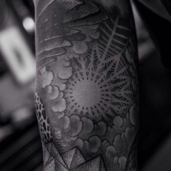 Mandala and clouds tattoo
