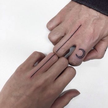 Matching finger lines tattoos