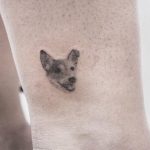 Micro puppy tattoo by lindsay april